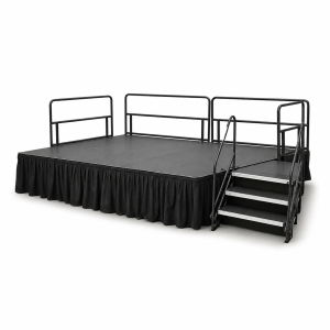 Portable indoor staging rentals in Orlando with black riser stage, stairs and black skirting