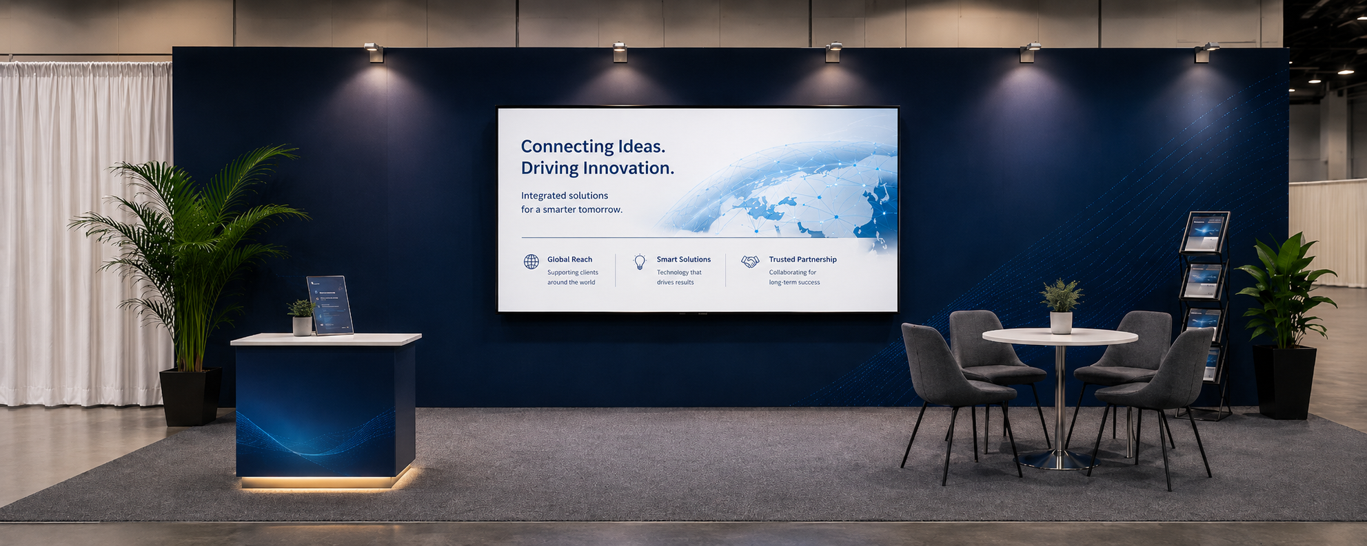 Trade show exhibit AV rental with large display monitor and meeting area in Orlando